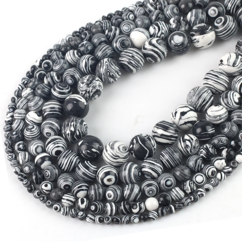 Матовые бусины из натурального черного малахита круглые с рассыпчатым камнем