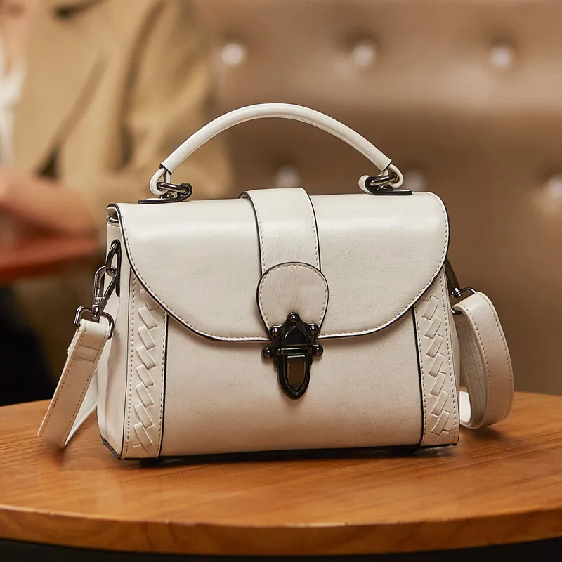 Женская мини-сумка через плечо из натуральной кожи |