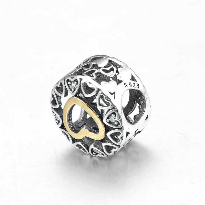 Золотые ажурные бусины в форме сердца из чистого серебра с кубическим цирконием