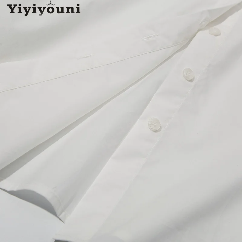 

Yiyiyouni Spring Peter Pan Collar White Shirts Women Loose Ruffles Cotton Blouse Women Korean Style Long Sleeve Shirts Tops 2021