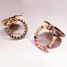 Suitable for iphone Huawei Samsung Redmi Xiaomi 360 degree rotating mobile phone holder colorful bead ring holder