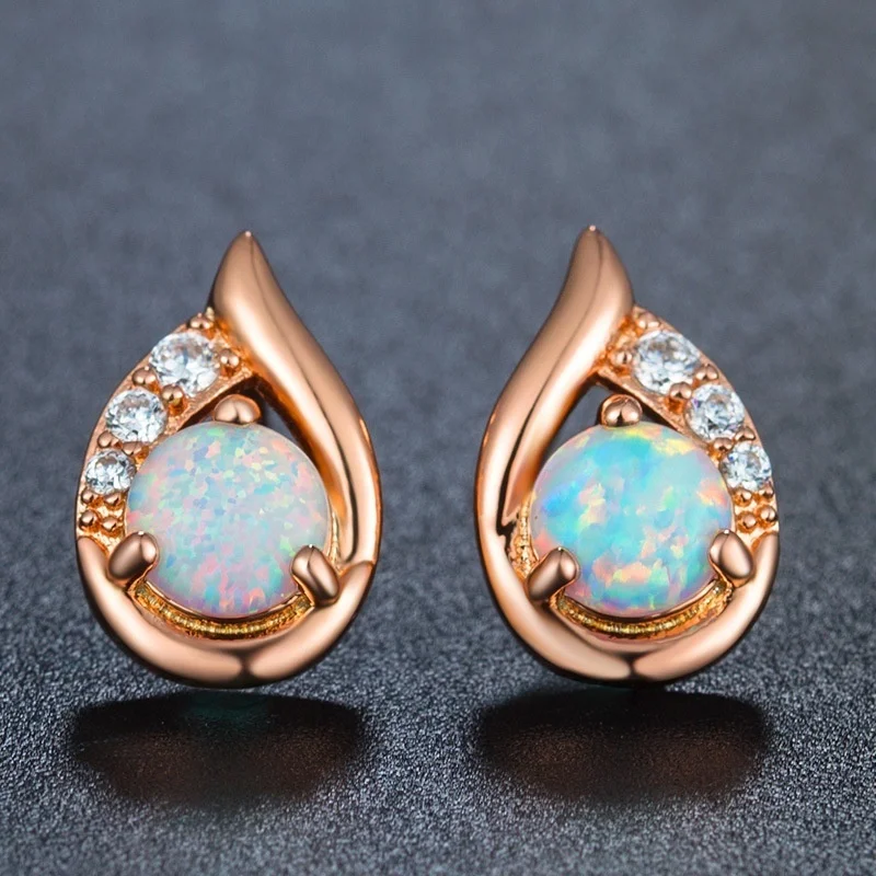 Серьги-гвоздики с имитацией белого огненного опала женские роскошные