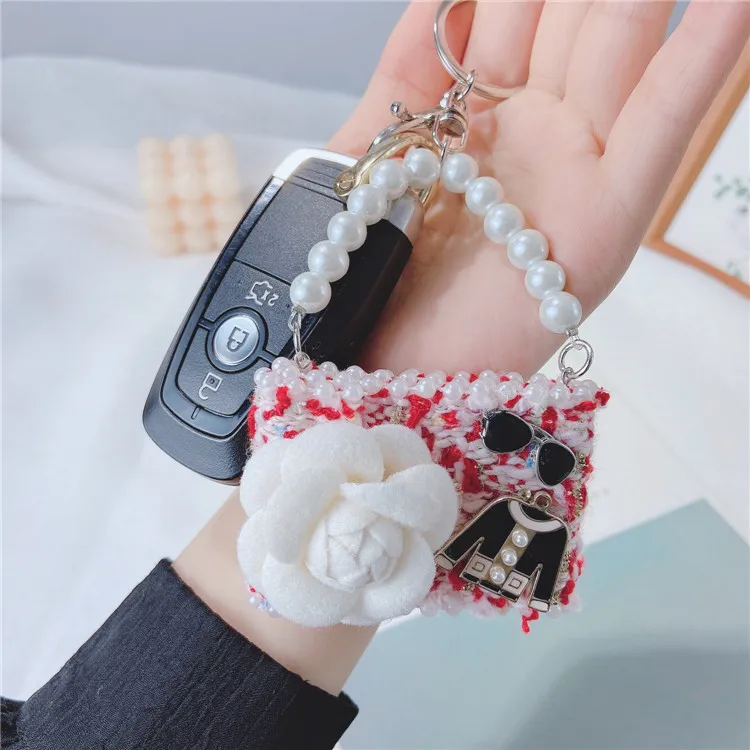 

Creative Fashion Ladies Backpack Charm Key Chain Personality Trend Wild Key Chain Fashion Pearl Bracelet Car Pendant Key Chain