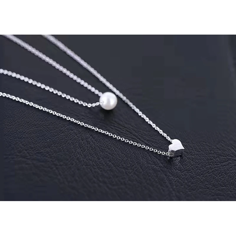 

S925 sterling silver necklace wholesale Korean fashion double Pearl Heart Necklace Personalized Silver clavicle chain jewelry