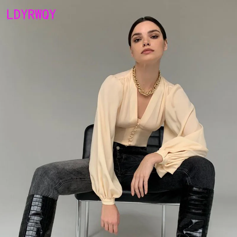 

Spring new - style jacket sexy V collar long - sleeve single row button waist shirt Europe and the United States