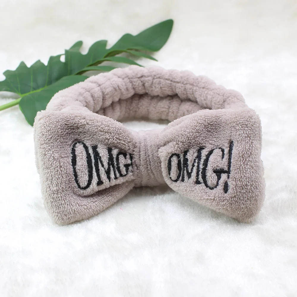 Мягкие флисовые повязки женские с бантом надписью OMG |