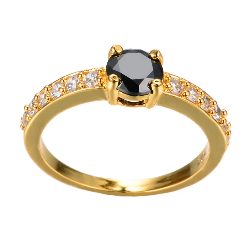 Крутое женское черное кольцо с кристаллами обручальное желтого и золотого цвета