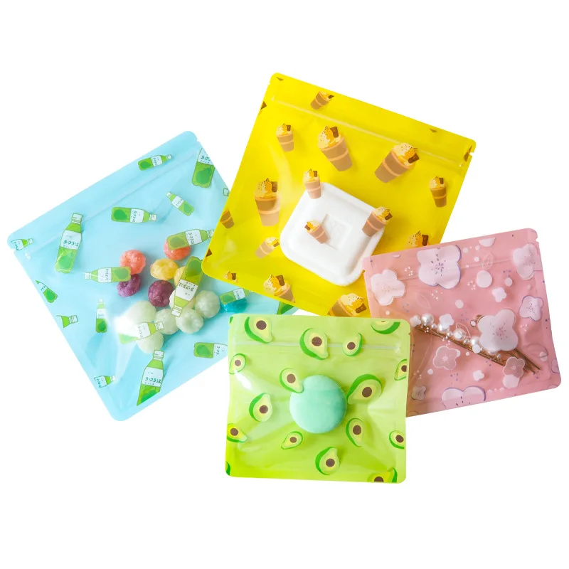 

100PCS Creative Cartoon Self Sealing Bag Cute Printing Transparent Snack Bag Hairpin Jewelry Sealed Packaging Bag