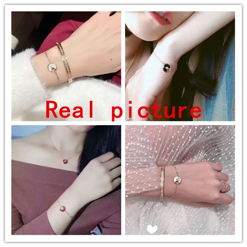 Женский Стальной браслет с цепочкой Titamiun черный/белый шармами в виде кружков и