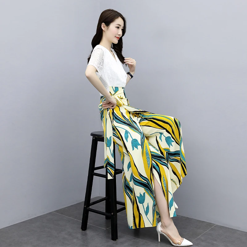 Женский комбинезон с кружевным верхом длинный цветочным принтом и разрезом лето