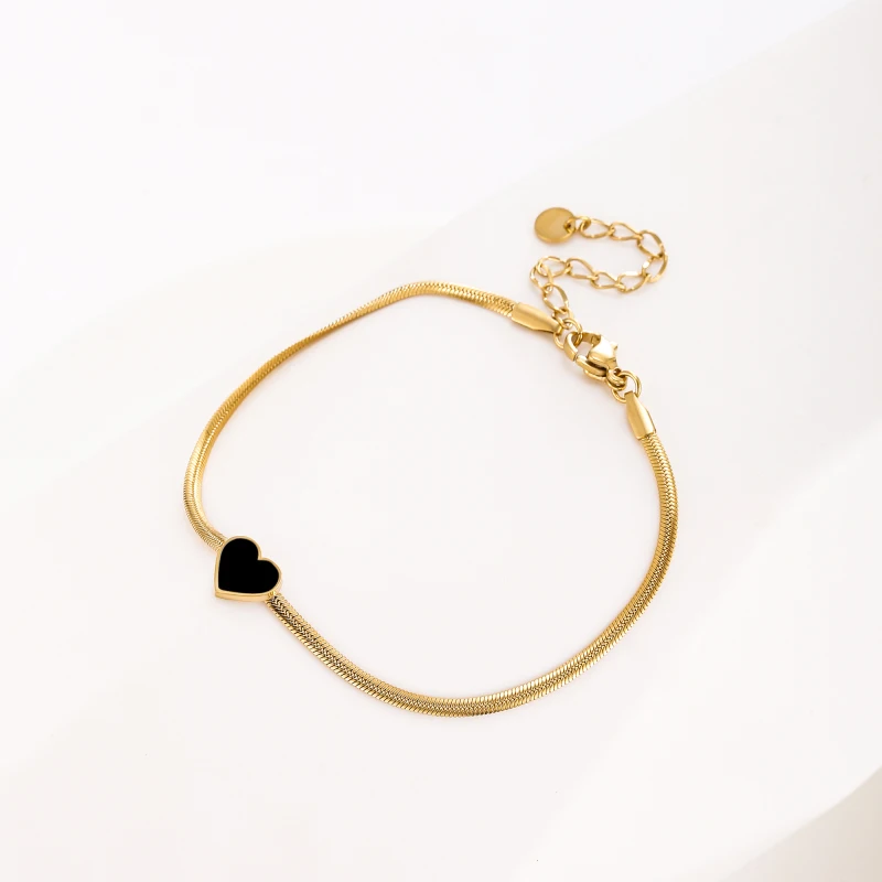 Женский браслет с подвеской в виде сердца золотистый цепочкой елочку трендовая