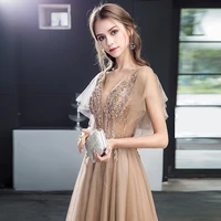 2022 luxury champagne evening dress a line appliques bead v neck backless elegant wedding party guests maid of honor prom gowns