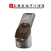 induction speaker with time oclock alarm clock phone holder function unviersal for andriod and iphone wireless touch speaker
