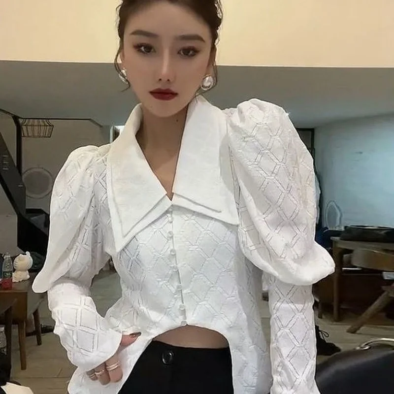 

Doll collar bubble long-sleeved shirt women 2021 spring and autumn new retro fashion solid color casual top