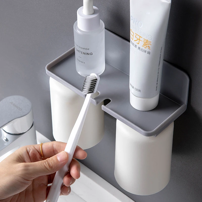

Bathroom Accessories Toothbrush Holder Bathroom Toothpaste Storage Rack Toothbrush Cup Rack No Punch Wall Mount Rack Banheiro