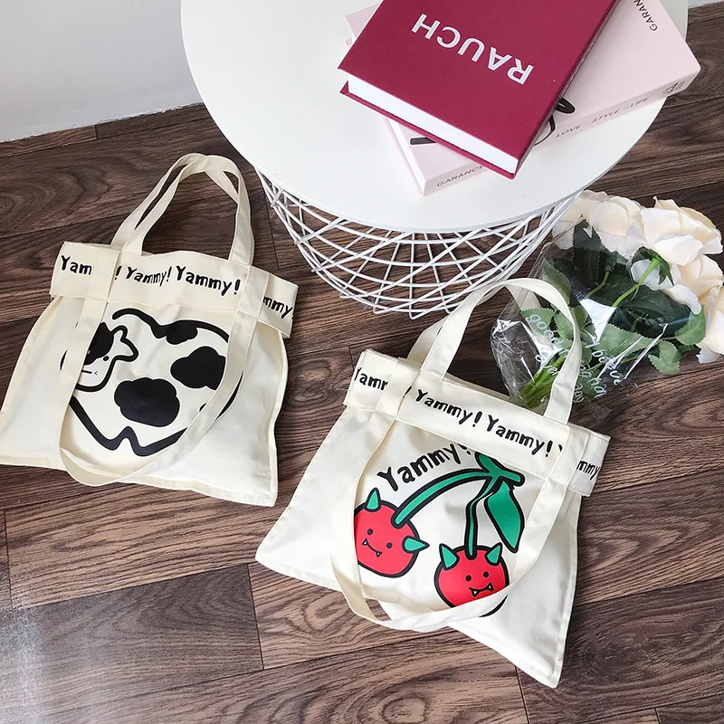 

Eco-friendly Canvas Bag Women New Handbag Commuting One Shoulder Shopping Tote Canvas Shoulder Bag Print Yammy Cherry Cow