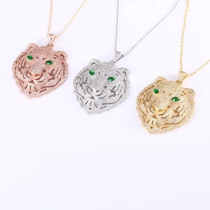 Ожерелье с подвеской в виде головы тигра зеленым глазом | Украшения и аксессуары