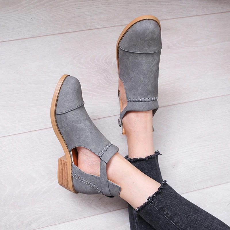 

2021 new spring and autumn hollow buckle short boots women's shoes thick heel flat shoes solid color sandals comfortable