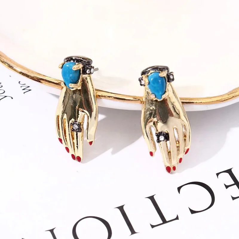 

European and American talented designer hand-shaped fashion simple earrings