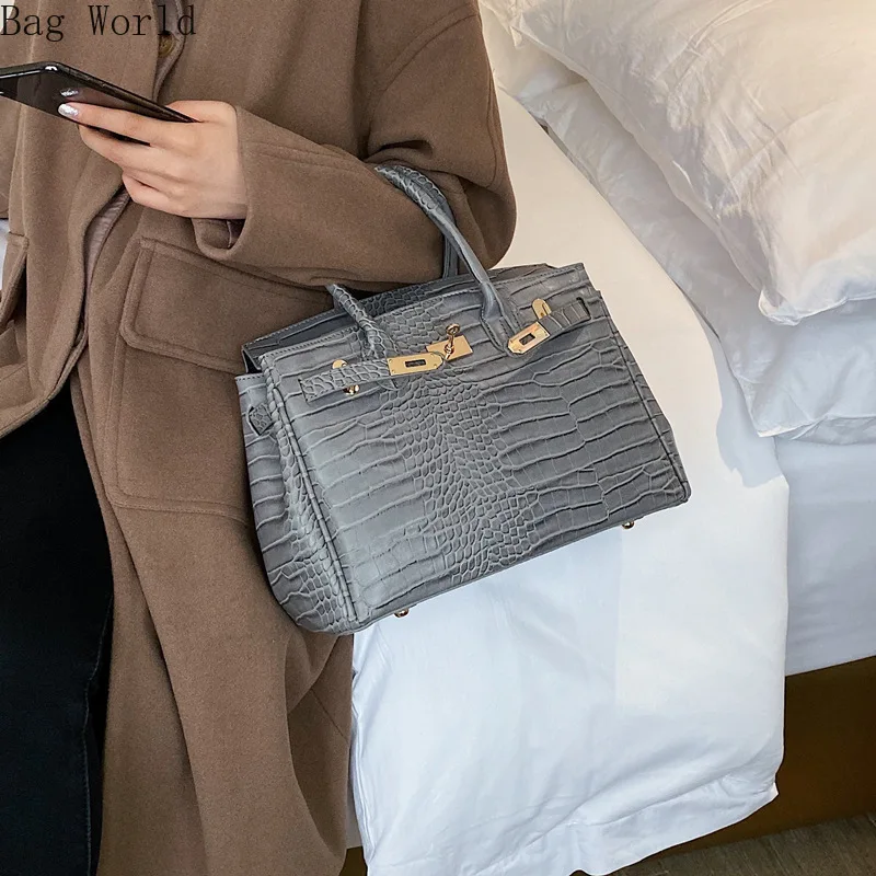 

Новая платиновая сумка с крокодиловым узором, Европейская и американская мода, сумка на плечо, большая офисная роскошная дизайнерская сумк...