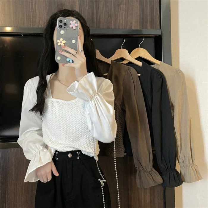 

Design sense niche knitted splicing shirt women's autumn 2021 new Pullover bubble sleeve shirt versatile top fashion