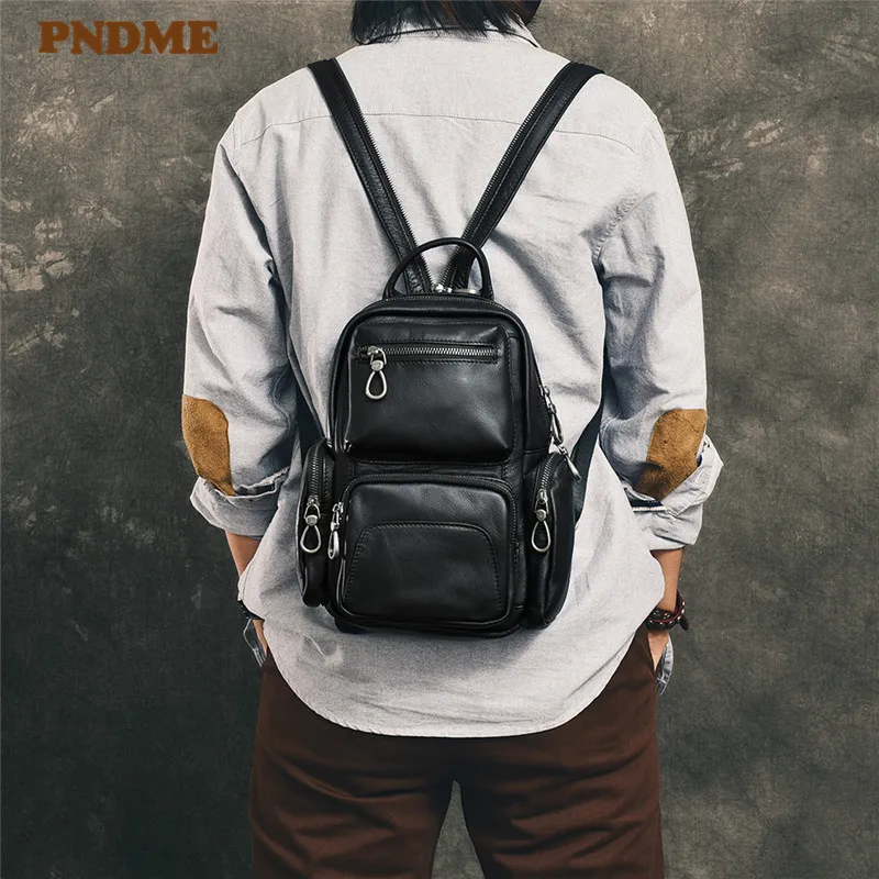 PNDME casual genuine leather men's women's small backpack multi-function multi-pocket soft cowhide luxury black daily chest bag