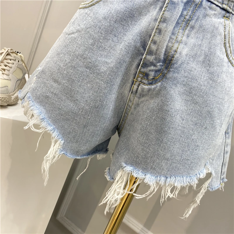 Рваные джинсовые шорты для женщин широкие потертые с завышенной талией и пряжкой