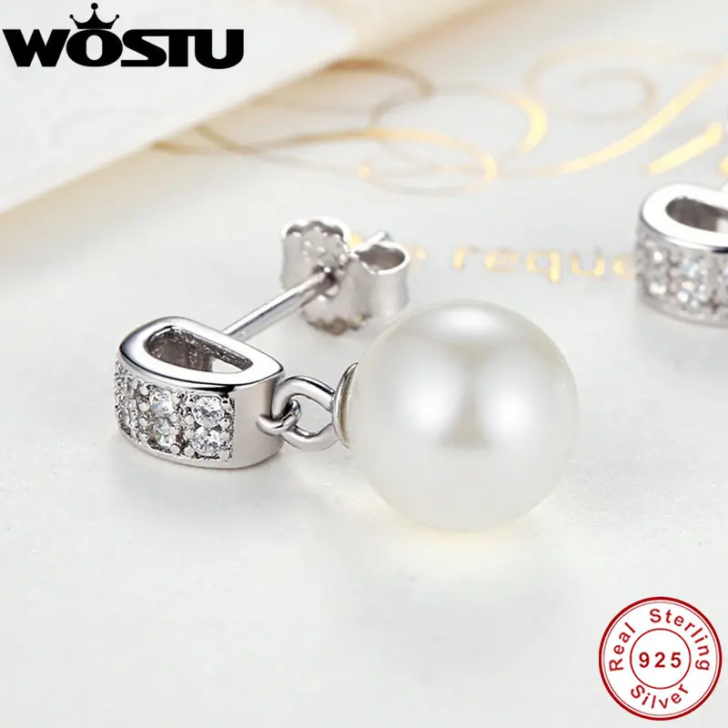 Женские серьги-подвески из серебра 100% пробы с прозрачным фианитом и жемчугом |