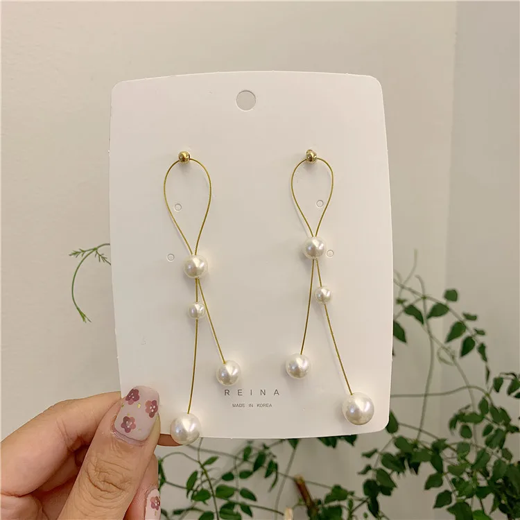 

Long temperament pearl double-line tassel earrings female 2020 new atmosphere is thin face earrings earrings