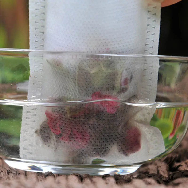 

Tea Bags 100Pcs/Lot Empty Scented Drawstring Pouch Bag 5*7CM Seal Filter Cook Herb Spice Loose Coffee Pouches Tools