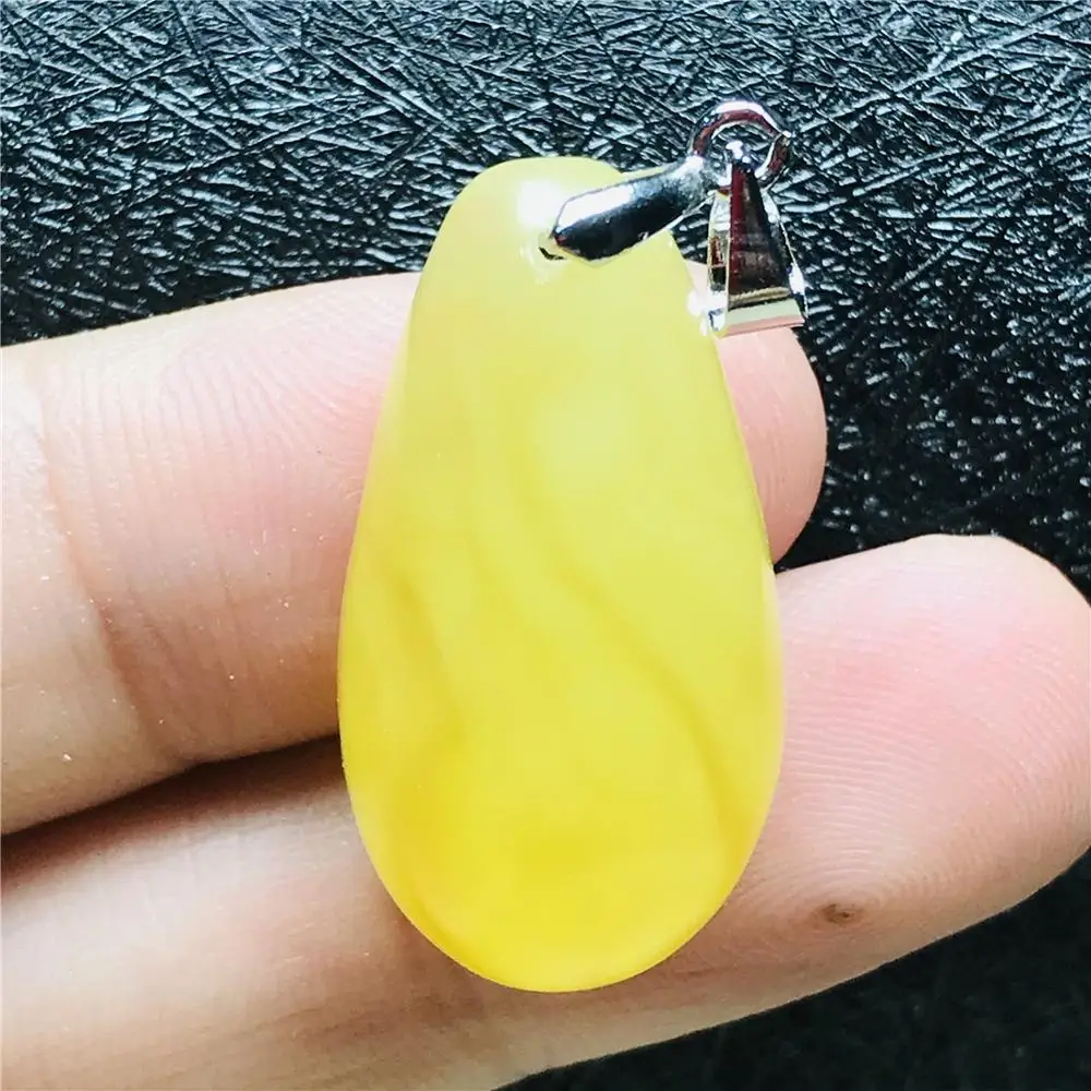 

Подвеска из натурального жёлтого янтаря, 27 х14х8 мм