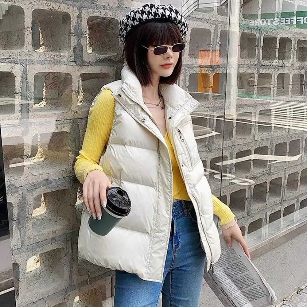 

Женская зимняя мода 2021, однотонные теплые куртки без рукавов, женский жилет на белом утином пуху, женский жилет с воротником-стойкой, безрук...