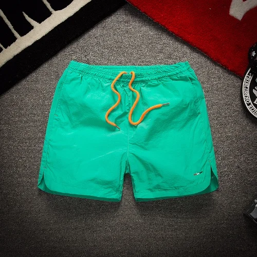 

Summer thin three-point dry pants men's Beach casual shorts simple solid sports men's pants
