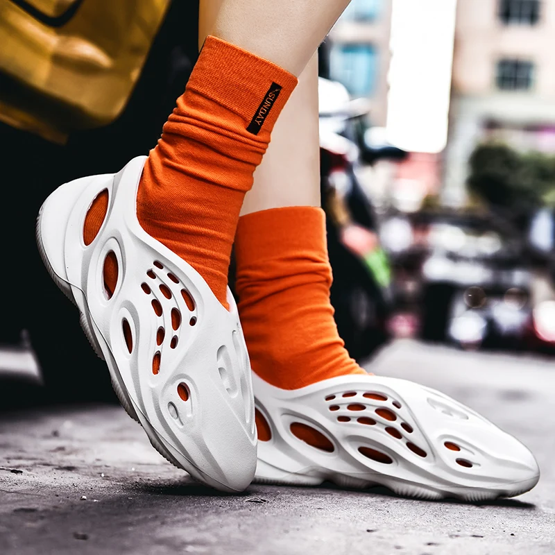 

New couple curve slippers, outdoor slippers, beach sandals and slippers, ladies slippers, men slippers, light and comfortable