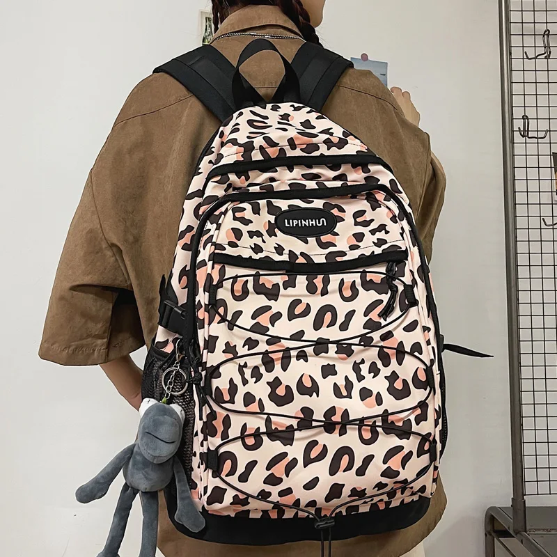 

DCIMOR New Large Capacity Waterproof Nylon Women Backpack Female Leopard Print Cross Rope Travel Bag College Girls Schoolbag