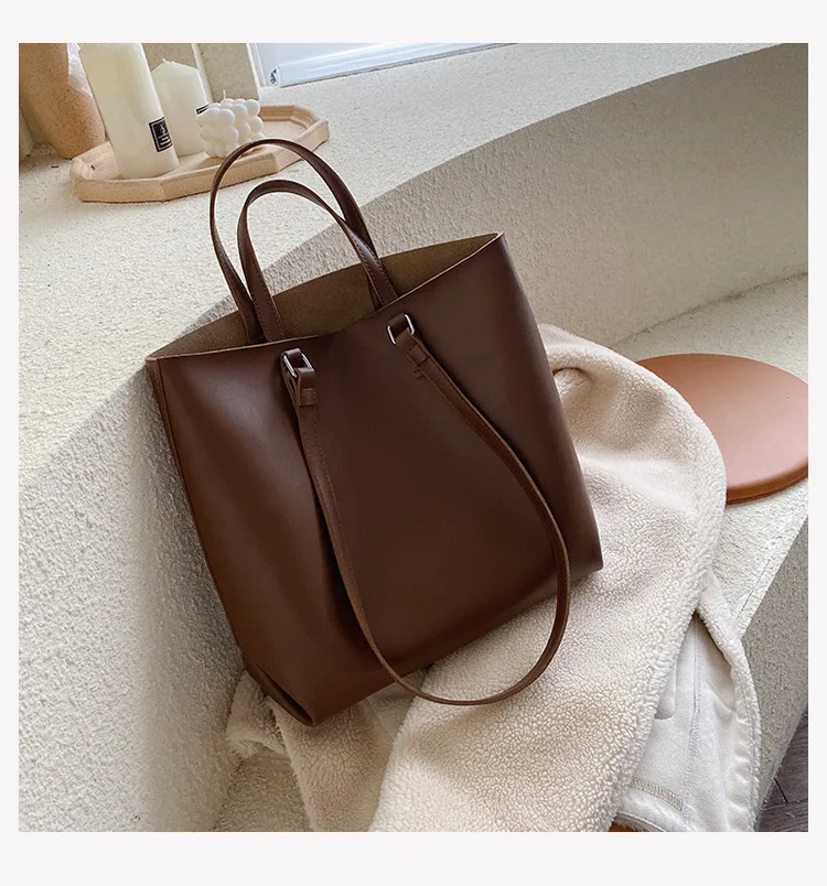 Модные стильные кожаные женские сумочки на цепочке большого размера черные