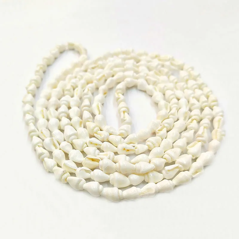 Белые раковины россыпью бусины из натурального материала для самостоятельного