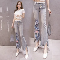 2022 elastic flower embroidery flare pants women ripped hole jeans mid waist wide leg bell bottoms denim trousers a39