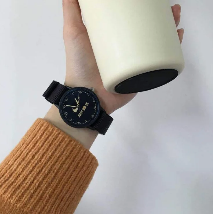 

Small daisy watch ins wind GD the same student Korean version of the simple canvas belt watch creative couple girlfriends watch