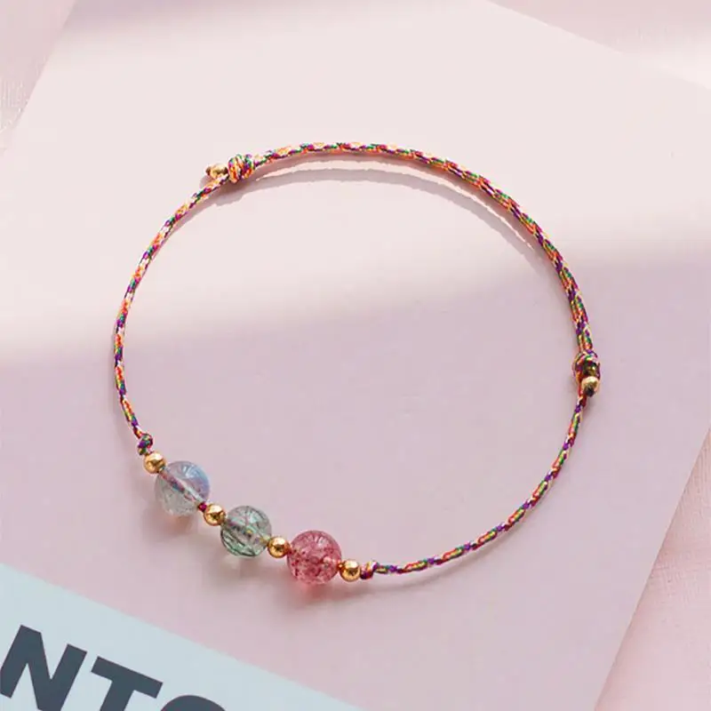 

Strawberry crystal crystal bracelet female student forest transfer beads black Korean hand-woven hand rope with peach blossom re