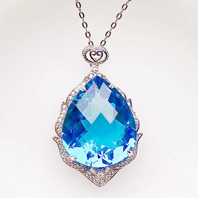 топаз капля. голубой топаз капля. кулон с голубым топазом. топаз капелька кулон. топаз капелька.