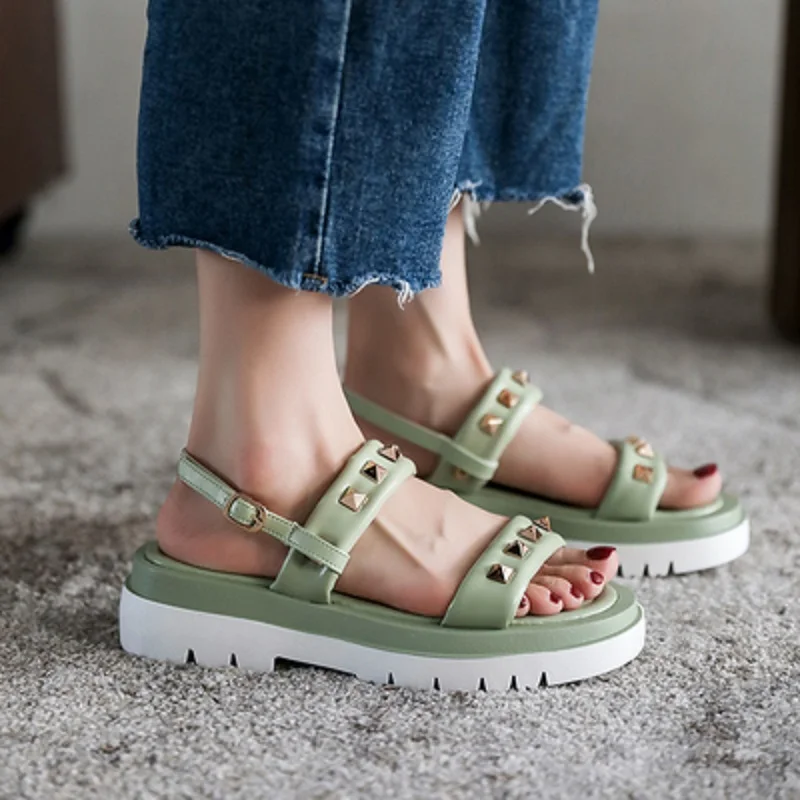 

Trendy Fashion Solid Color Sexy Rivet Buckle Mid-Heel Open Toe Roman Style Ladies Sandals Summer Hot Sale.