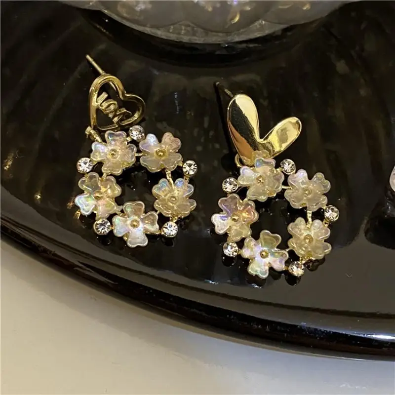 

Asymmetric Love Hollow Earrings Korean Niche Design Earrings Forest Fresh Fluorescent Flower Earrings Female Party Jewelry
