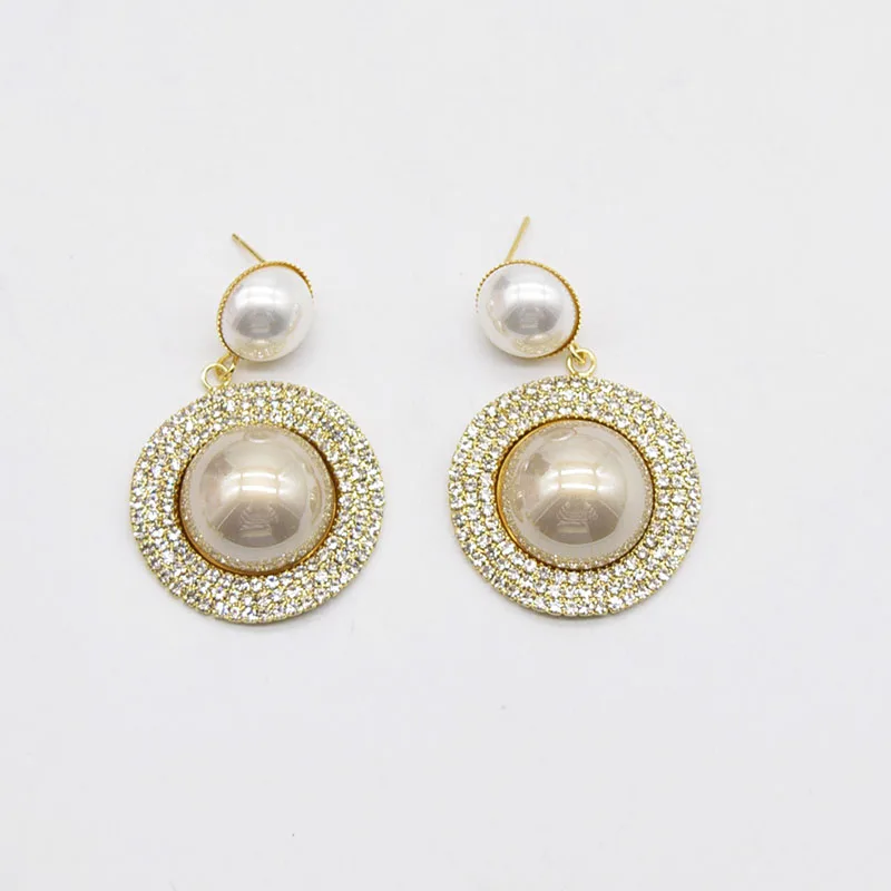 

Женские серьги-подвески с искусственным жемчугом