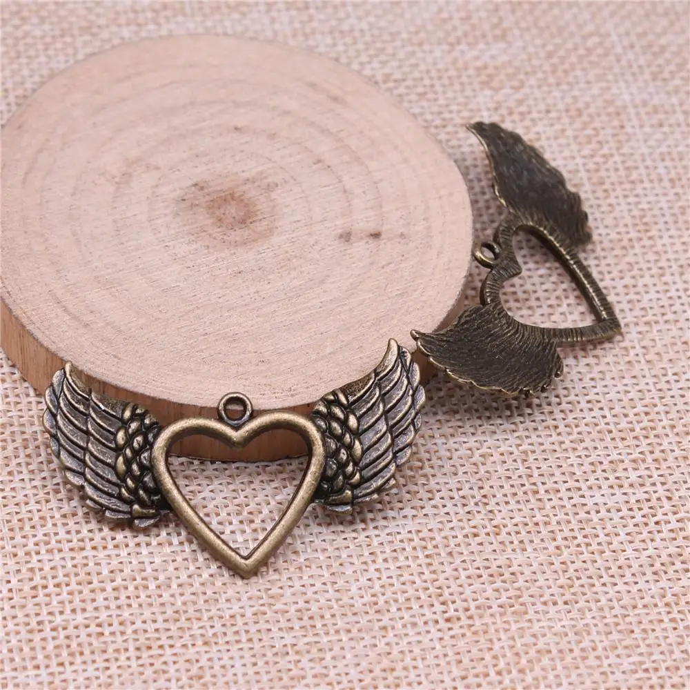 

Hollow Heart Wings Charms For Jewelry Making Findings Handmade DIY Craft 4pcs Antique Bronze Color 47x29mm