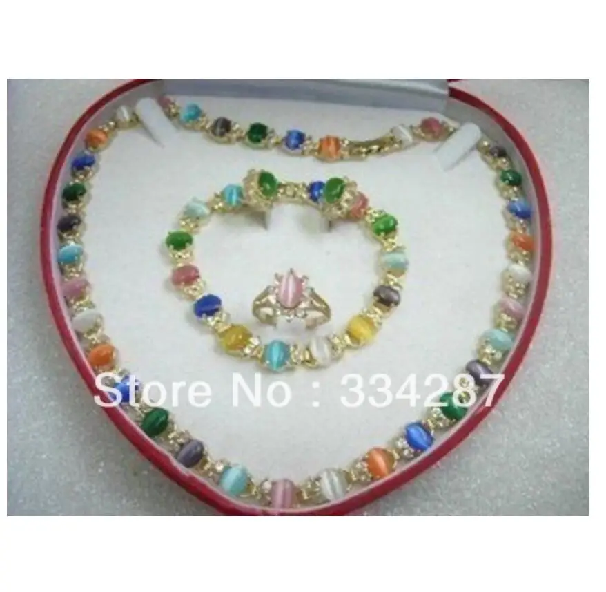 Комплект из колье браслета серег и кольца с разноцветным опалом | Украшения