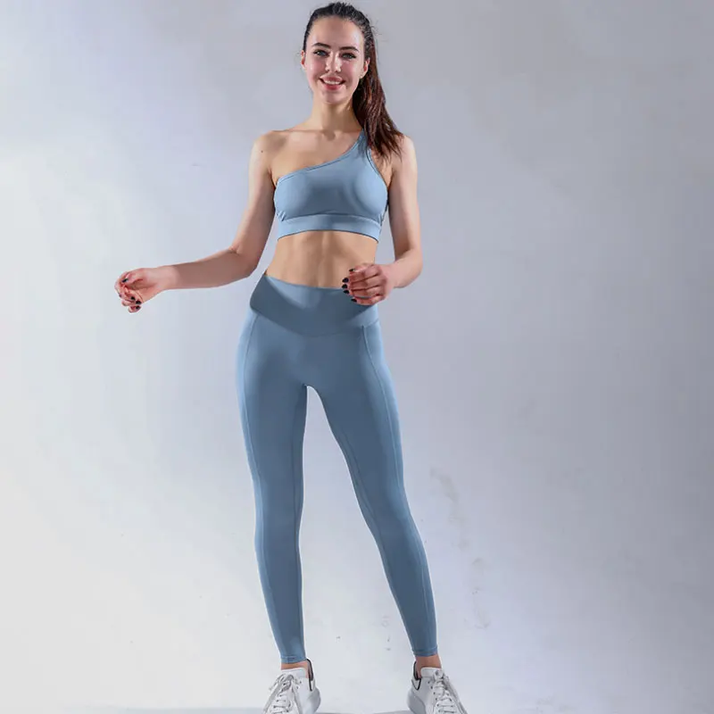 

Бесшовный однотонный комплект для йоги, женская одежда для спортзала, короткий топ на одно плечо, леггинсы, сексуальный спортивный костюм д...