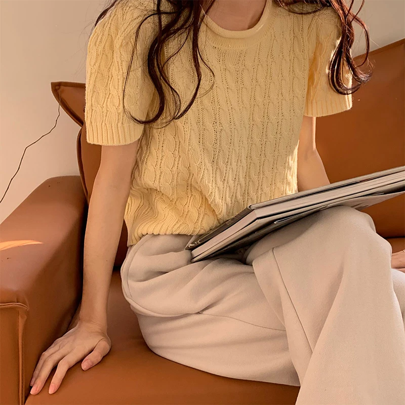 

Spring And Summer Korean Version Of The New Loose Round Neck Hollow Out Short-Sleeved Knitted Solid Color Sweater Top Women
