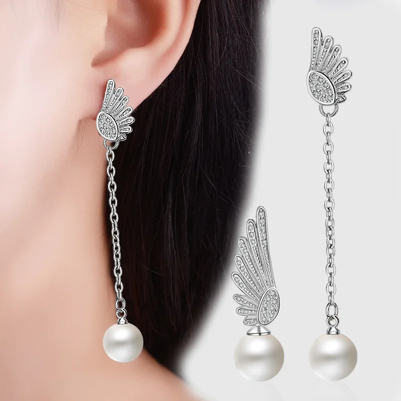 

Japan and South Korea's New Fashion Minimalist Temperament Pearl Asymmetric Angel Wing Earring Earrings Long Female Earrings