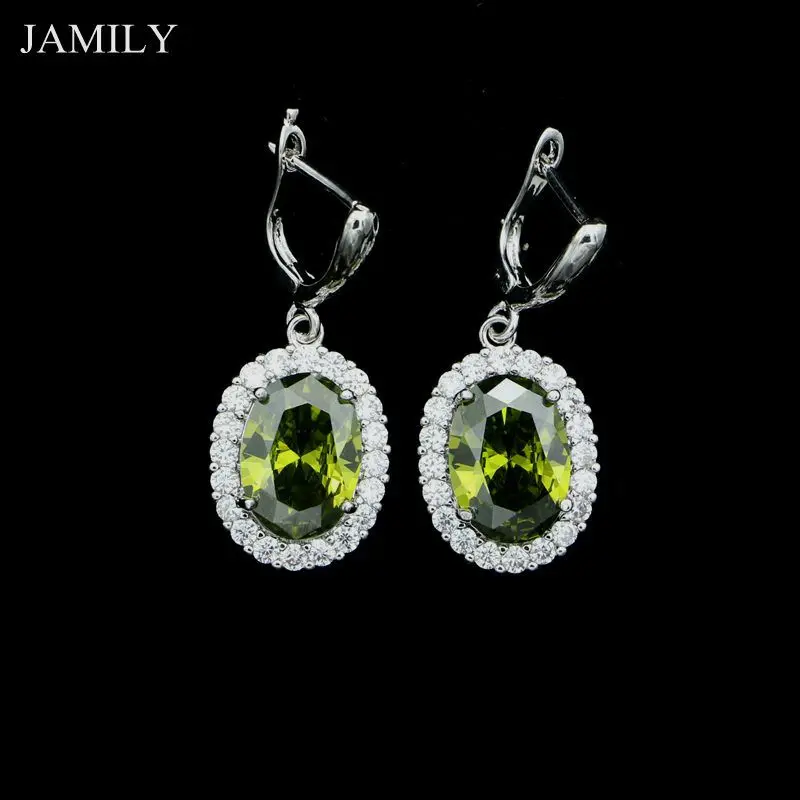 Модные серьги из серебра 925 пробы с оливковым зелёным камнем и белым кристаллом